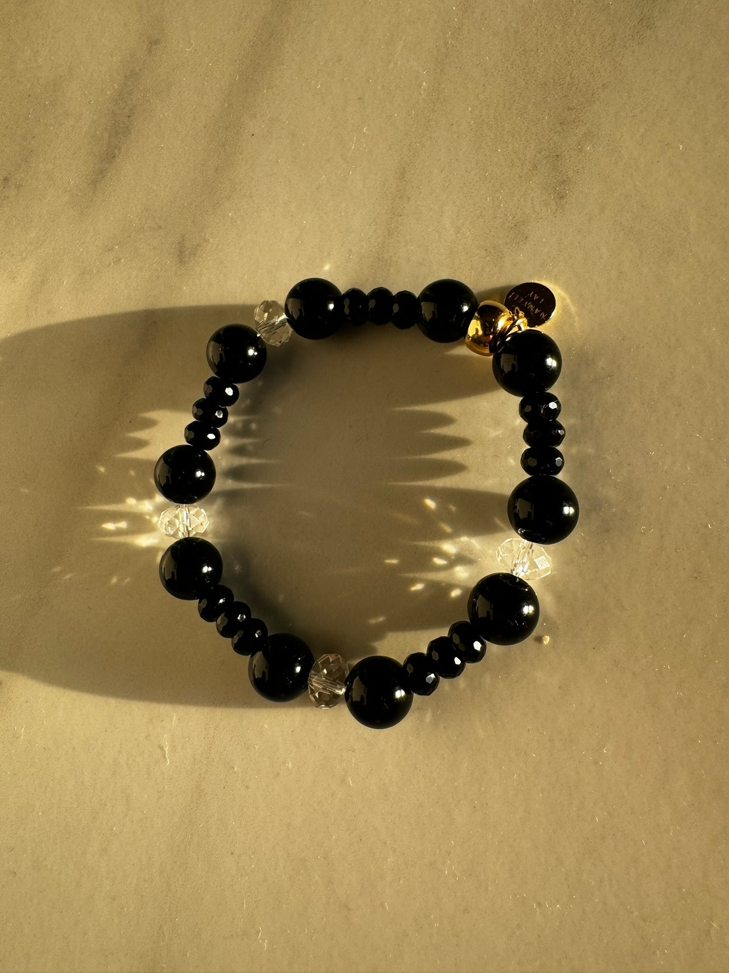 Black onyx and rock quartz bracelet